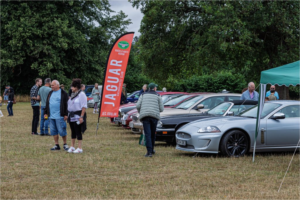 Show field with Jaguar Enthusiasts' Club banner
